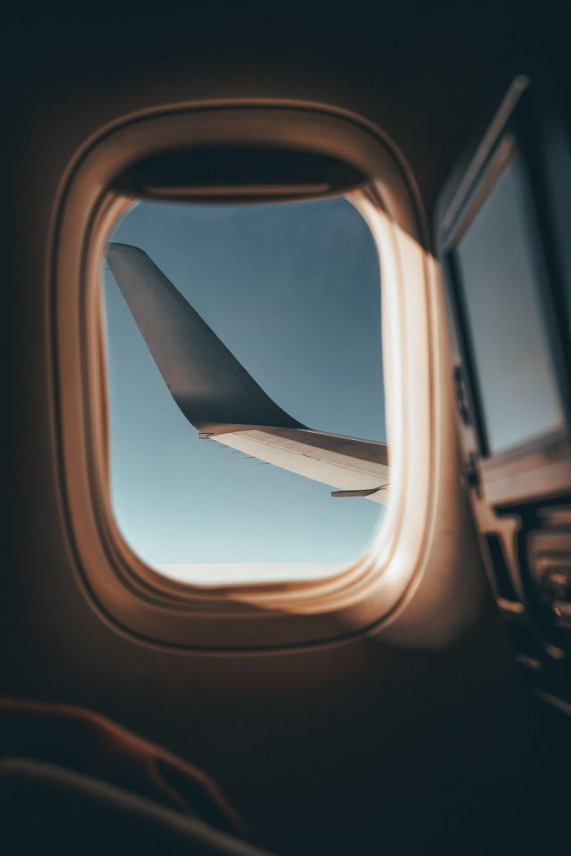 airplane wing sunrise